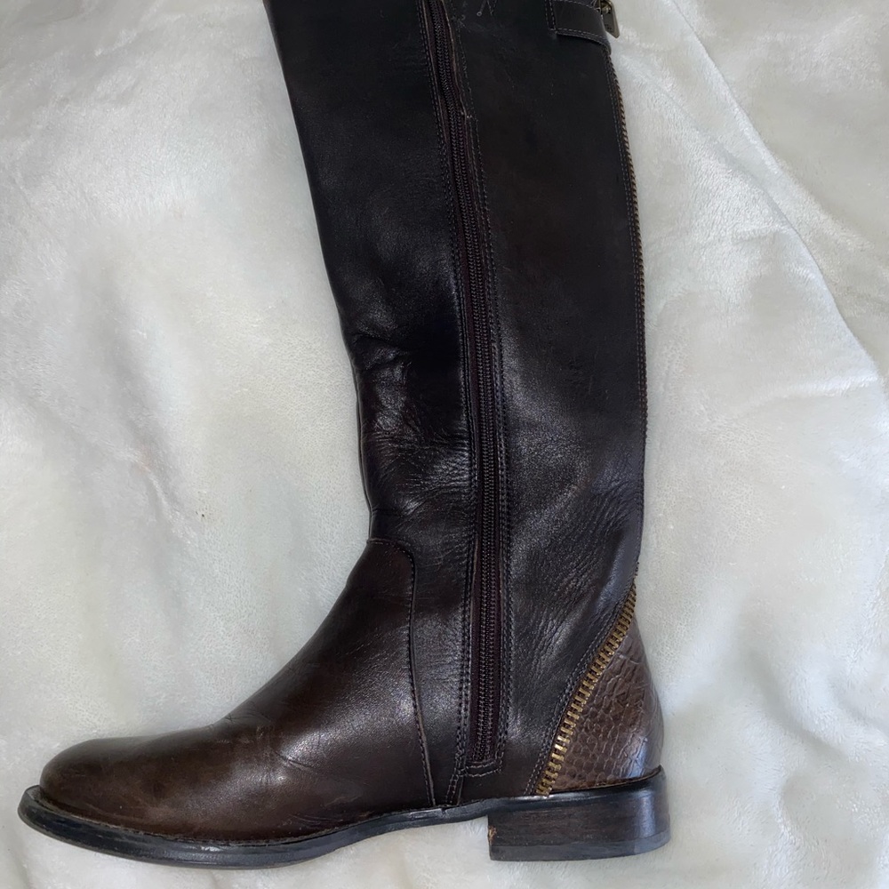 Below the knee leather boots